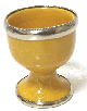 Coquetier artisanal marocain en poterie de couleur jaune emaille et cercle de metal decoratif argente